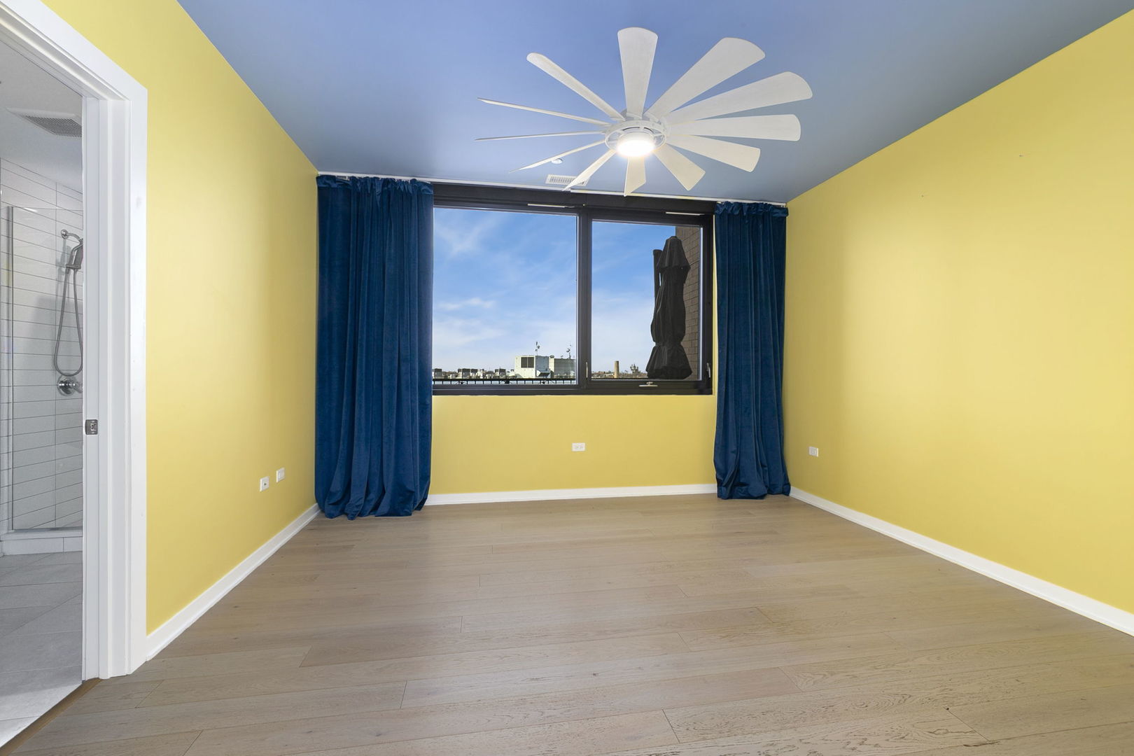 1648 West Division Street, Unit 703 Chicago, IL 60622 - Photo 27 of 41 a view of an empty room with a window