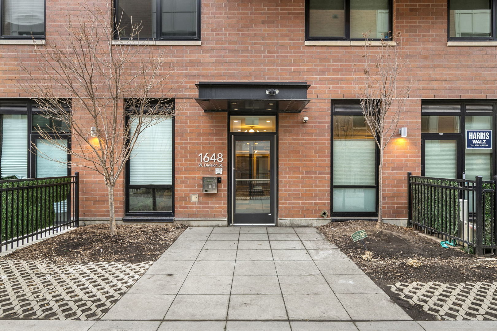 1648 West Division Street, Unit 703 Chicago, IL 60622 - Photo 34 of 41 a view of a brick house with a large window