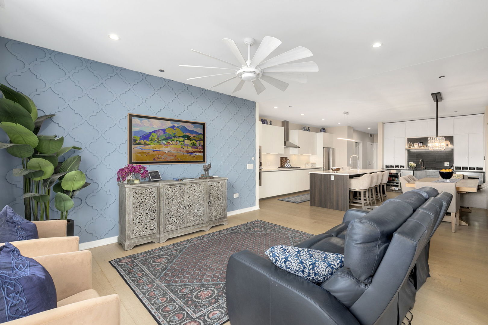 1648 West Division Street, Unit 703 Chicago, IL 60622 - Photo 9 of 41 a living room with furniture and a flat screen tv