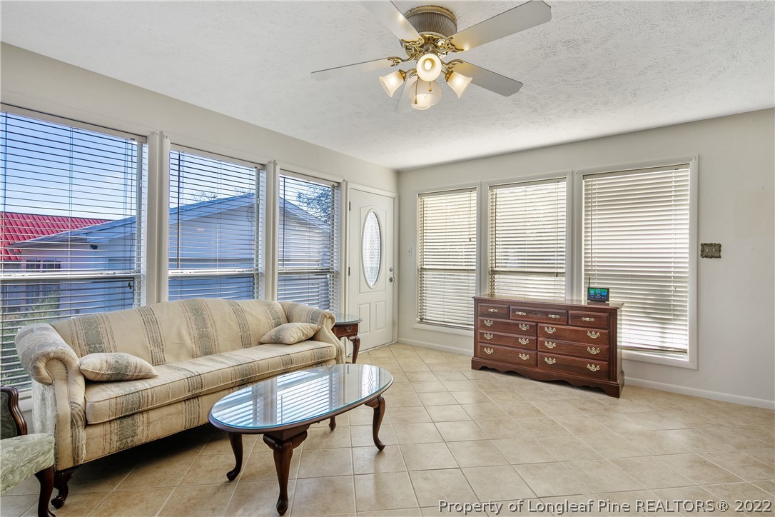 211 Duncan Road Spring Lake, NC 28390 - Photo 25 of 46 a living room with furniture and a large window