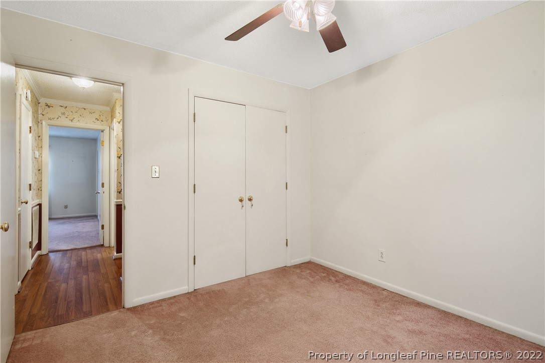 211 Duncan Road Spring Lake, NC 28390 - Photo 35 of 46 a view of a room with a hallway and wooden floor