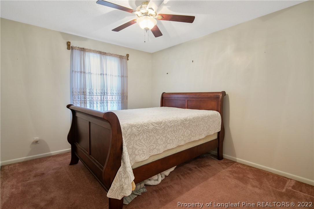 211 Duncan Road Spring Lake, NC 28390 - Photo 38 of 46 a bedroom with a bed and window