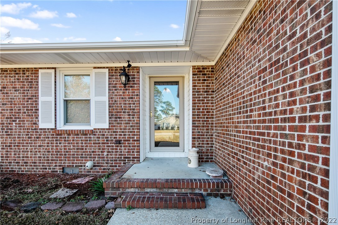 211 Duncan Road Spring Lake, NC 28390 - Photo 4 of 46 a view of brick wall of the house
