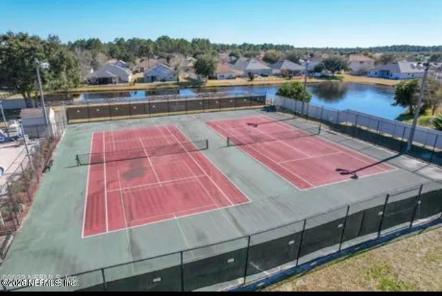 a view of a balcony with an outdoor space and seating area