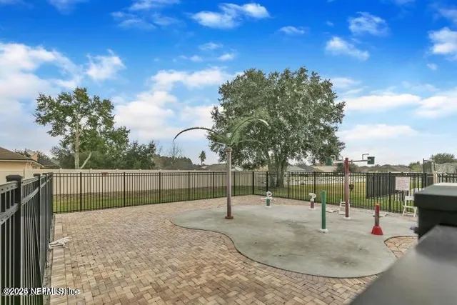 a view of outdoor space and backyard