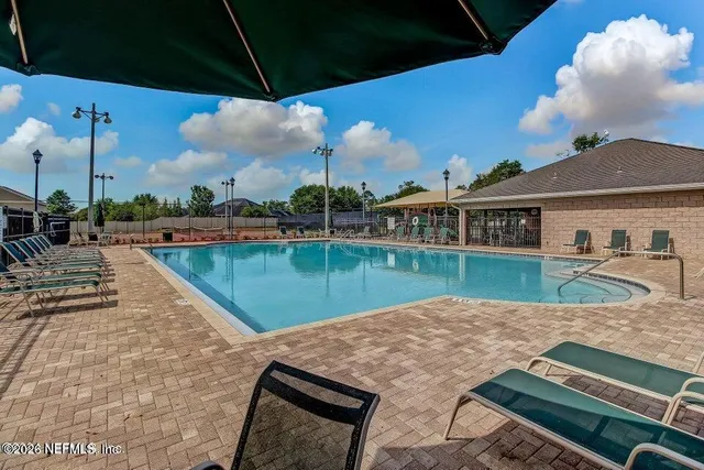 a view of a house with a swimming pool