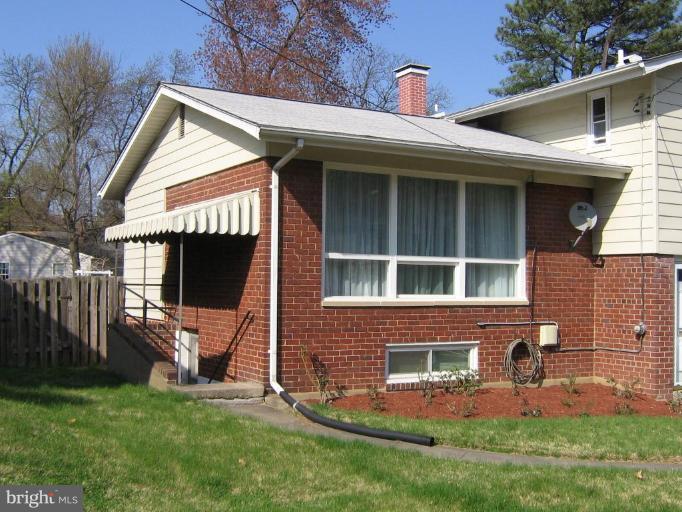 4003 Ferrara Drive Silver Spring, MD 20906 - Photo 2 of 29 a view of a house with backyard