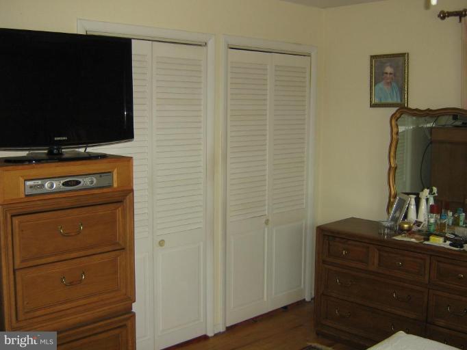4003 Ferrara Drive Silver Spring, MD 20906 - Photo 15 of 29 a room with a flat screen tv