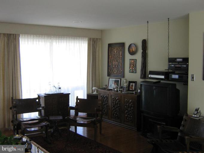 4003 Ferrara Drive Silver Spring, MD 20906 - Photo 18 of 29 a view of a workspace with furniture and a window