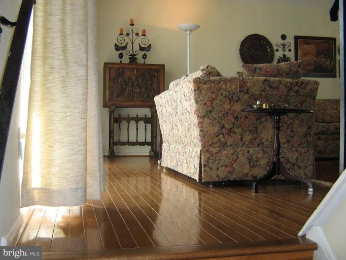 4003 Ferrara Drive Silver Spring, MD 20906 - Photo 19 of 29 a living room with furniture and wooden floor