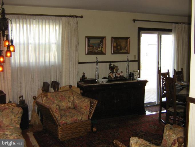 4003 Ferrara Drive Silver Spring, MD 20906 - Photo 23 of 29 a room with furniture and window
