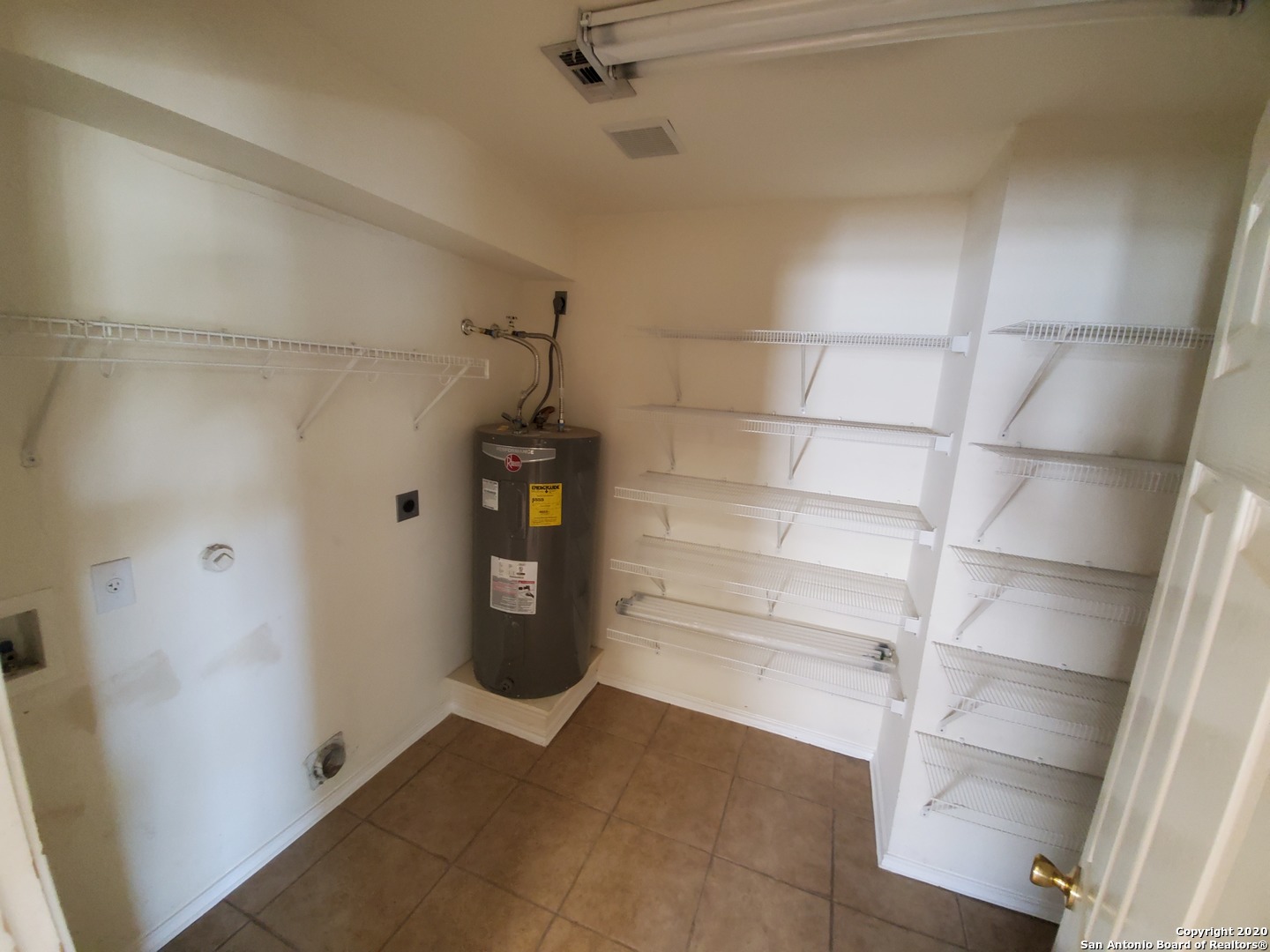 671 Rattler Bluff San Antonio, TX 78251 - Photo 12 of 15 a view of walk in closet with empty racks