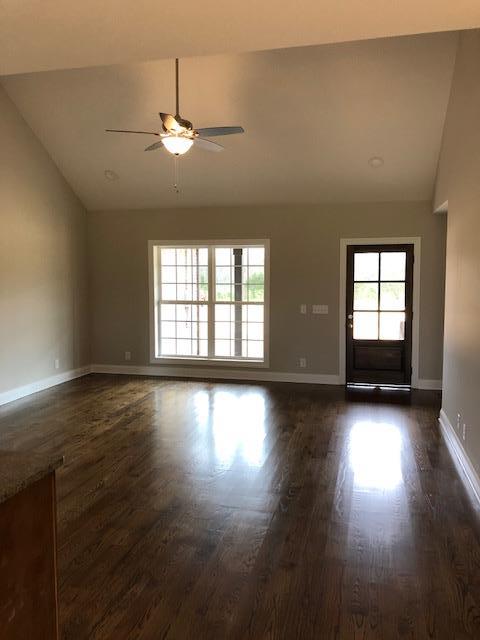 396 Coopertown Road Unionville, TN 37180 - Photo 2 of 12 Living room with beautiful sand and finish real hardwood floors.