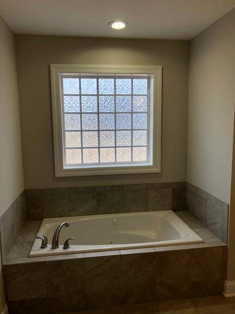 396 Coopertown Road Unionville, TN 37180 - Photo 8 of 12 Relax in this master bath jacuzzi tub.