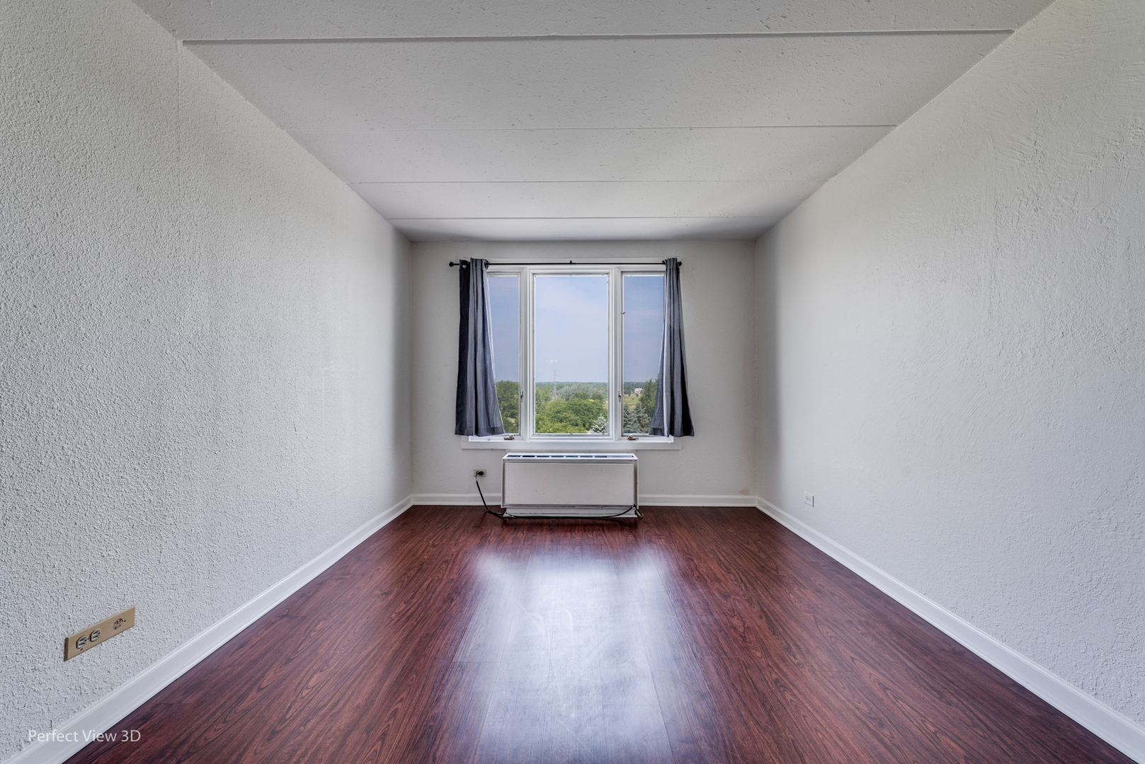 1 Renaissance Place, Unit 622 Palatine, IL 60067 - Photo 11 of 22 an empty room with wooden floor and windows