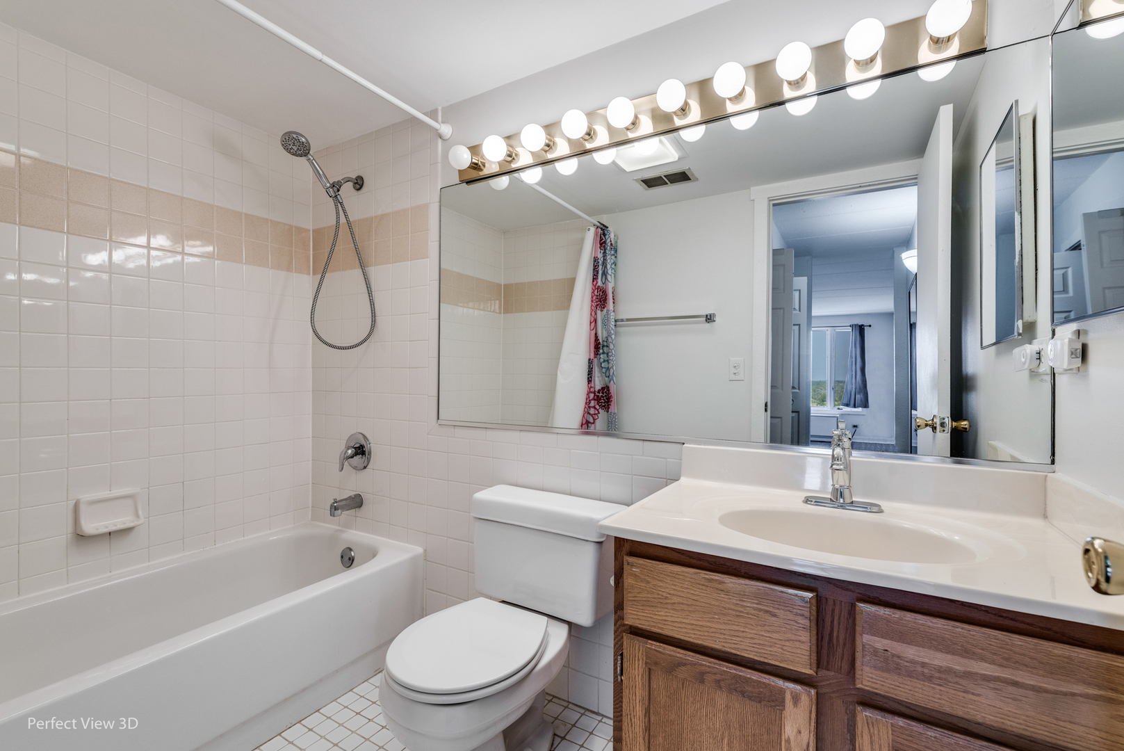 1 Renaissance Place, Unit 622 Palatine, IL 60067 - Photo 14 of 22 a bathroom with a sink a toilet a mirror a bathtub and shower