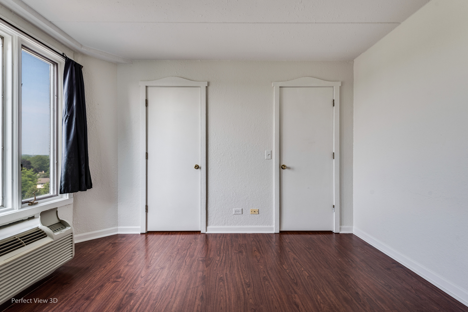 1 Renaissance Place, Unit 622 Palatine, IL 60067 - Photo 15 of 22 a view of an empty room with window and wooden floor