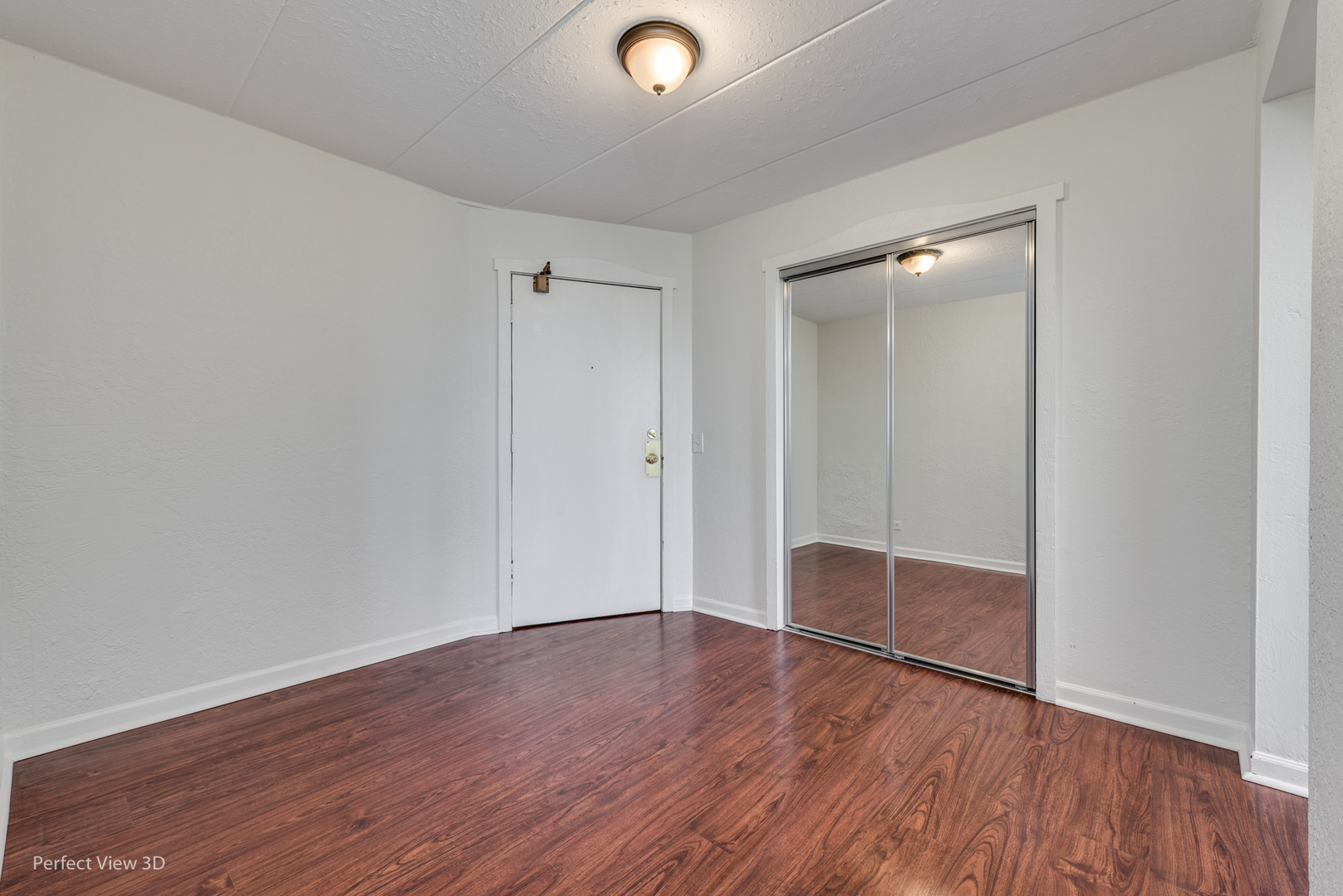 1 Renaissance Place, Unit 622 Palatine, IL 60067 - Photo 17 of 22 a view of an empty room with wooden floor and closet