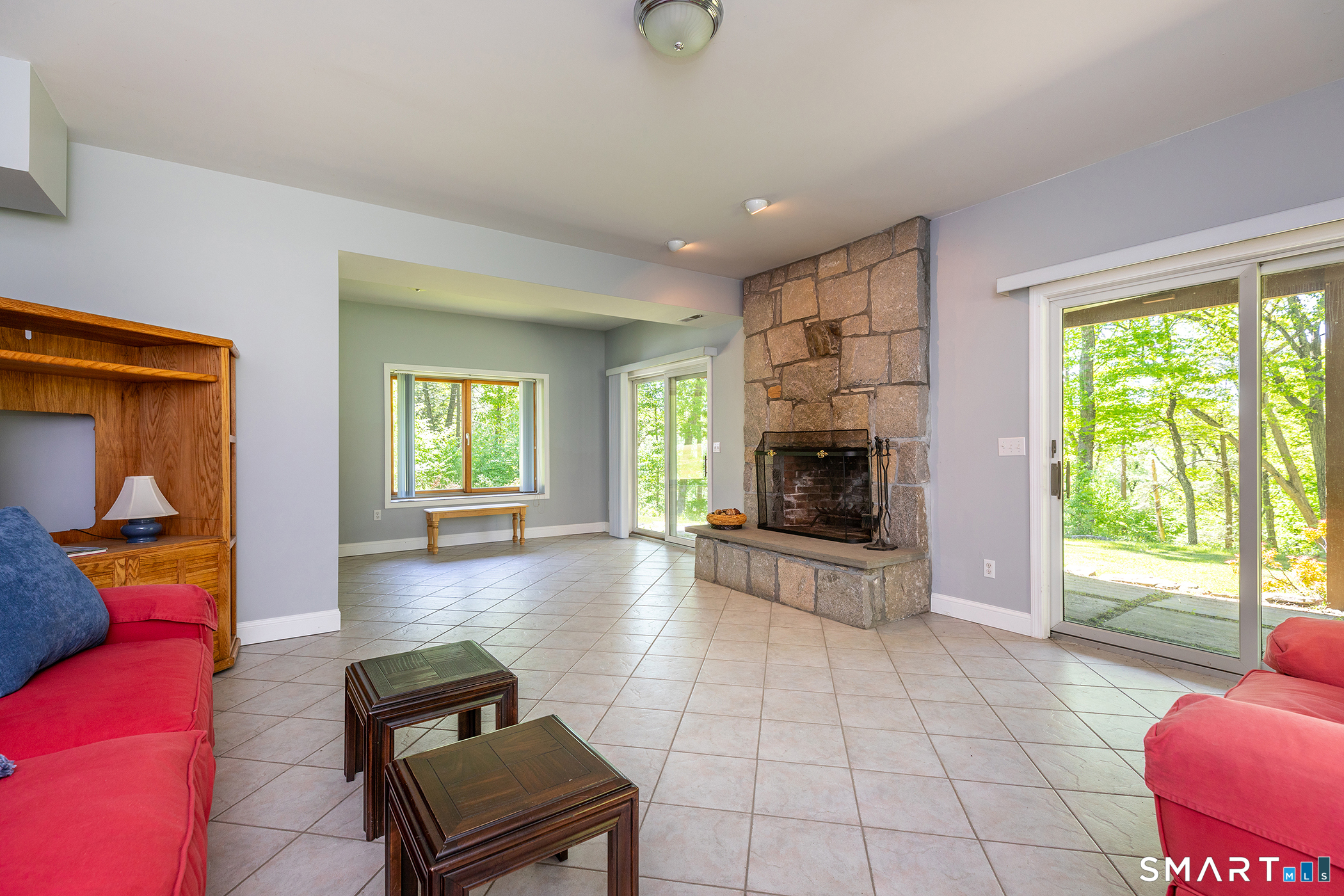 3 Old Forest Road Sherman, CT 06784 - Photo 26 of 38 a living room with furniture and a fireplace