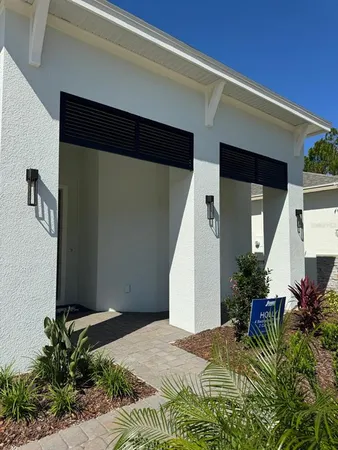 a large kitchen with kitchen island a sink stainless steel appliances and cabinets