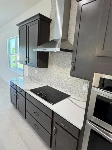 a utility room with sink and washer