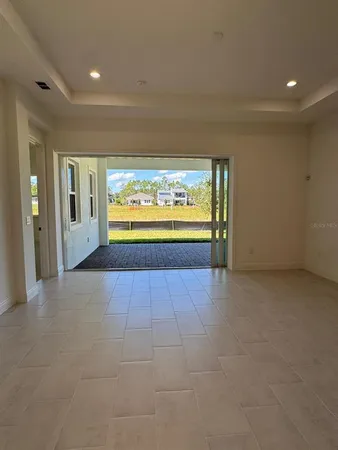 an empty room with windows