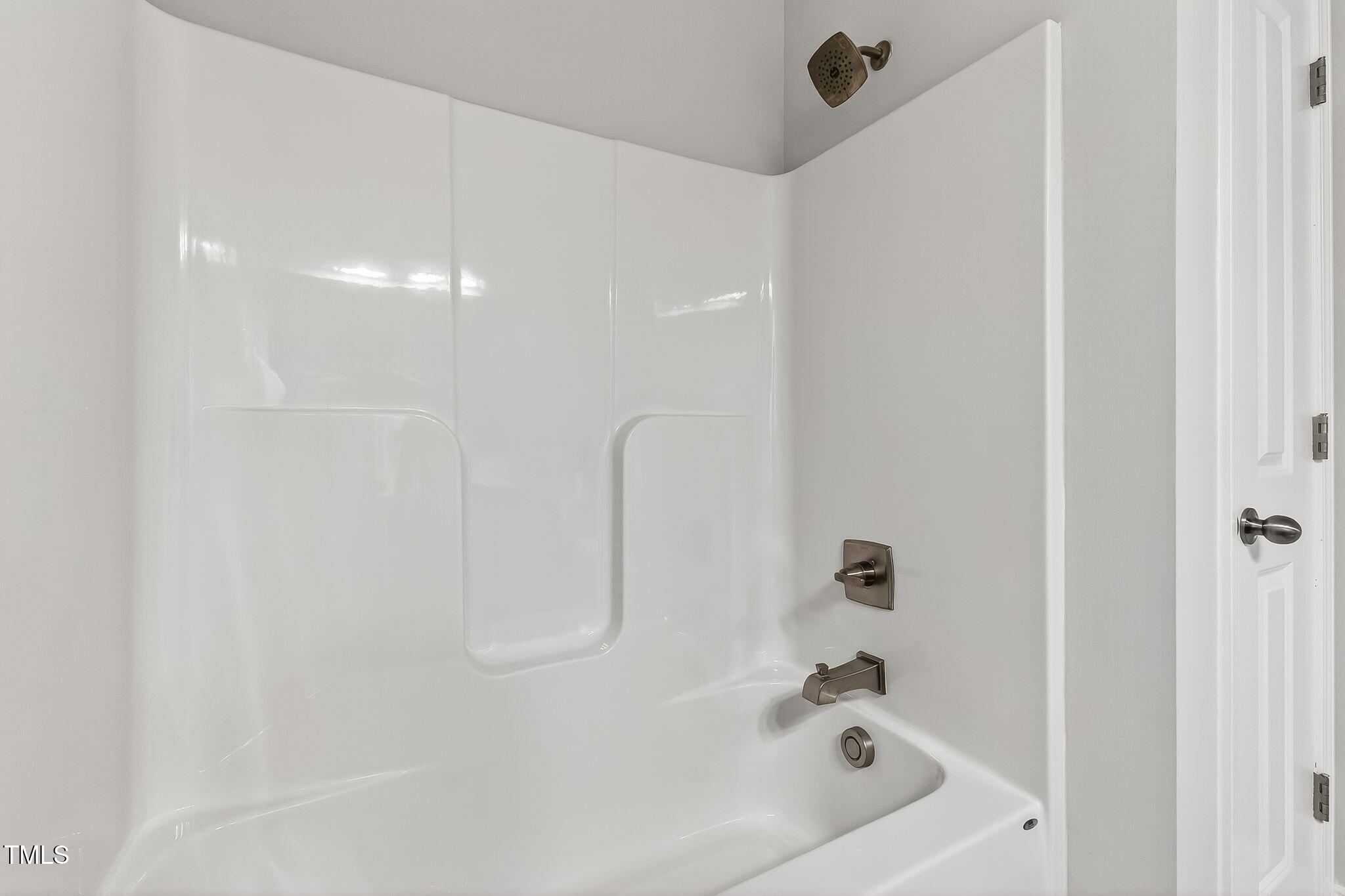 1217 Linkwood Way Fuquay-Varina, NC 27526 - Photo 32 of 44 a bathroom with a bathtub