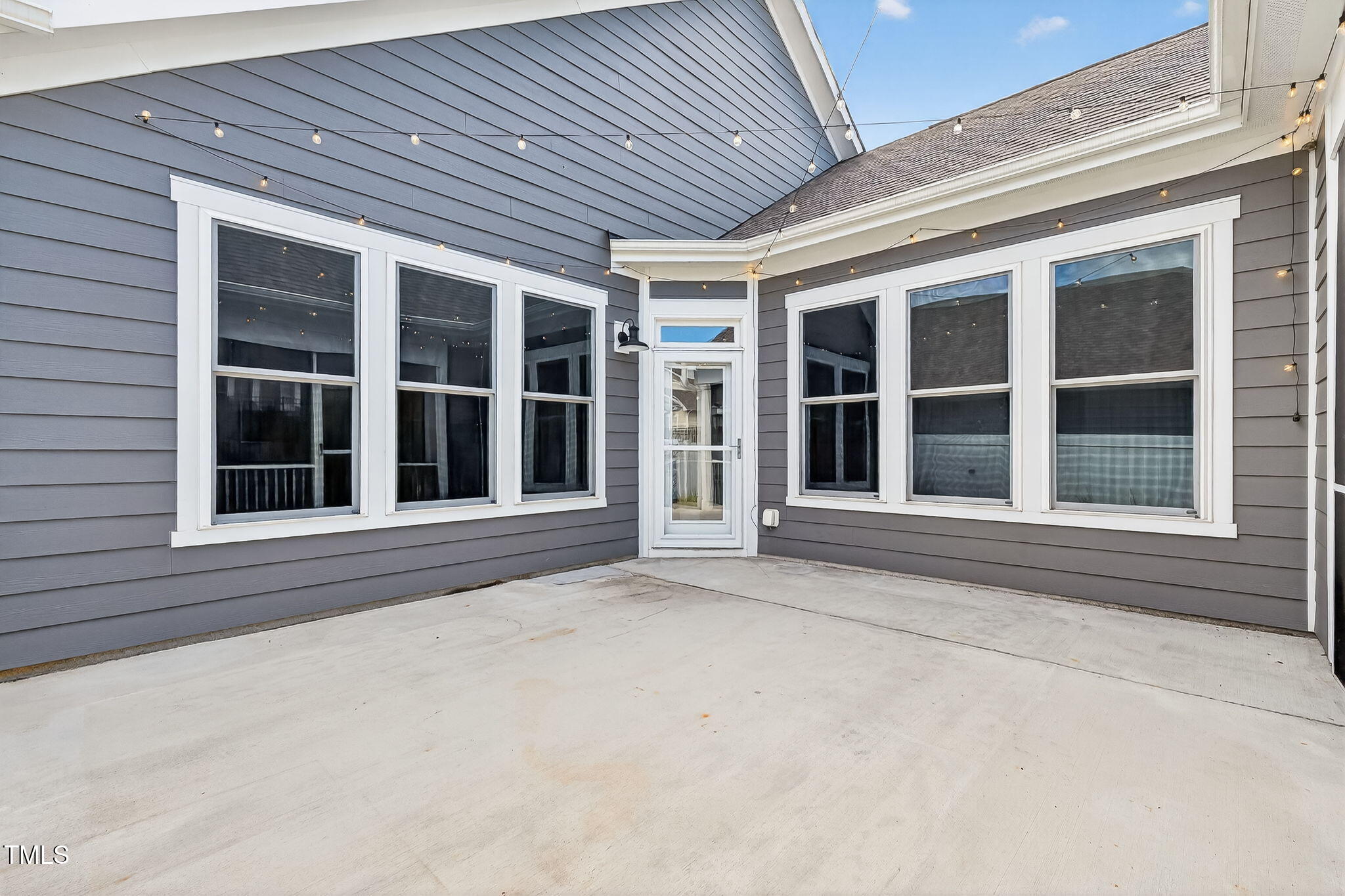 1217 Linkwood Way Fuquay-Varina, NC 27526 - Photo 38 of 44 front view of a brick house with a large window