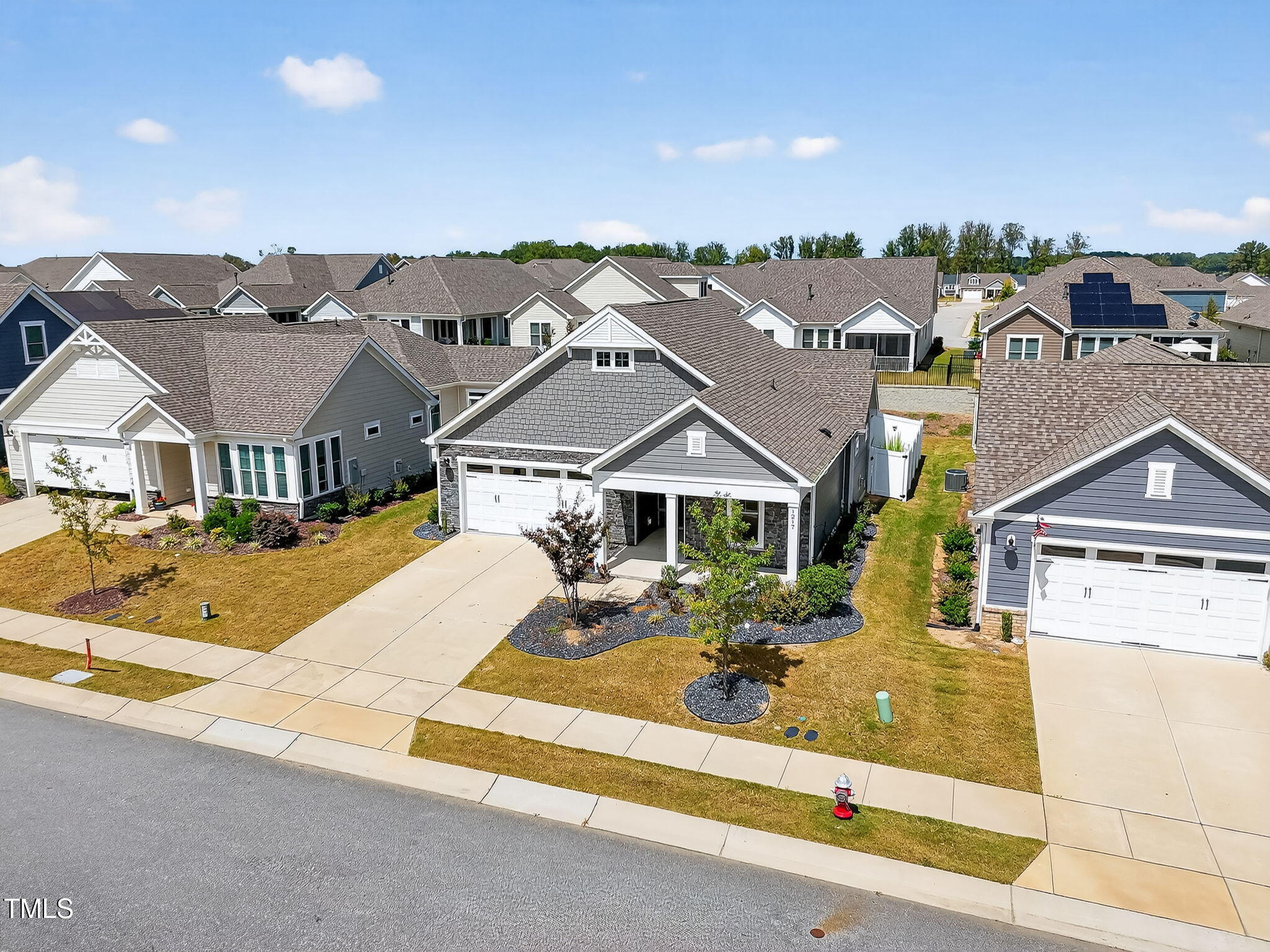 1217 Linkwood Way Fuquay-Varina, NC 27526 - Photo 40 of 44 an aerial view of residential houses with yard