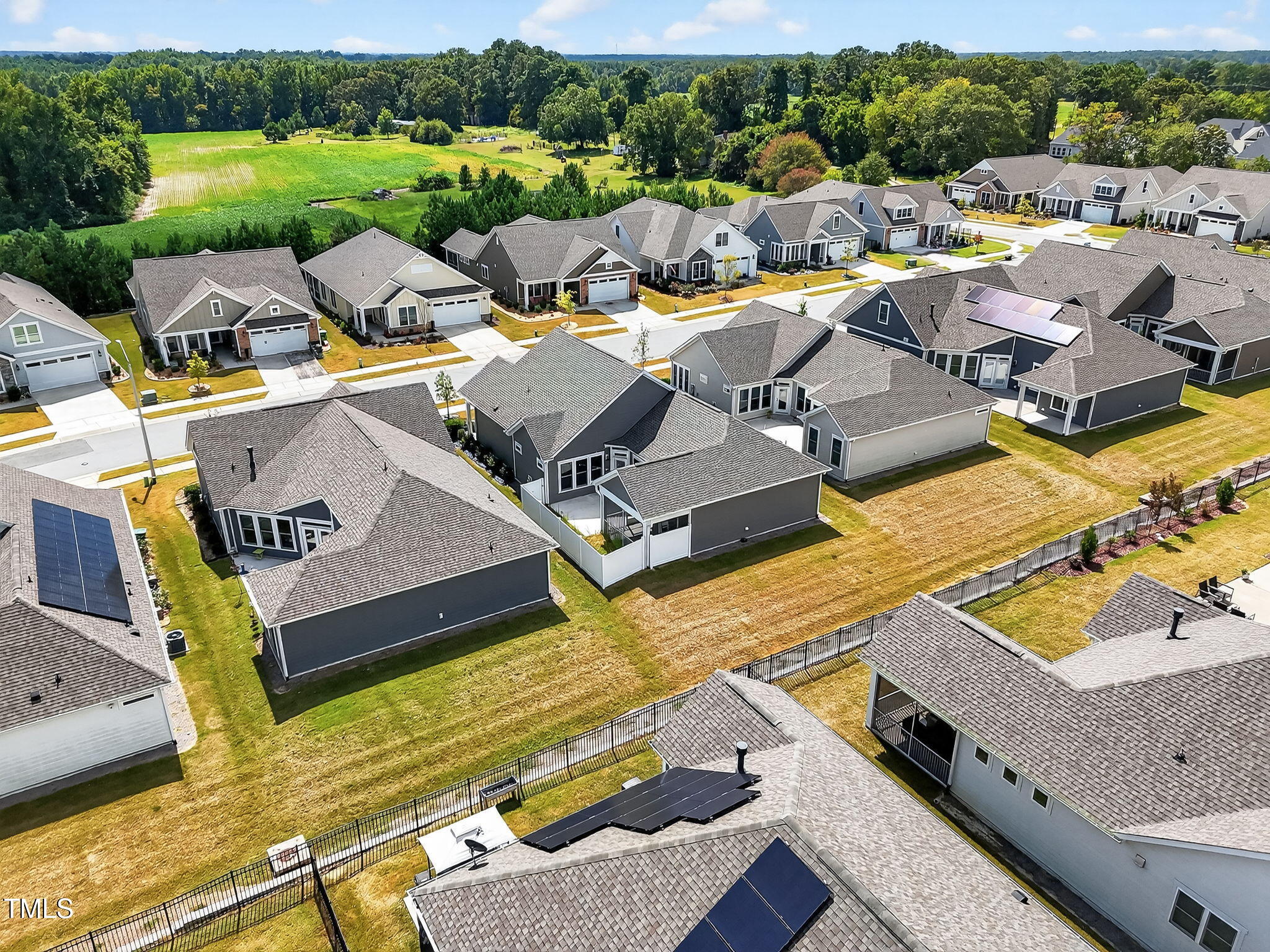 1217 Linkwood Way Fuquay-Varina, NC 27526 - Photo 44 of 44 an aerial view of a house with pool patio and outdoor seating
