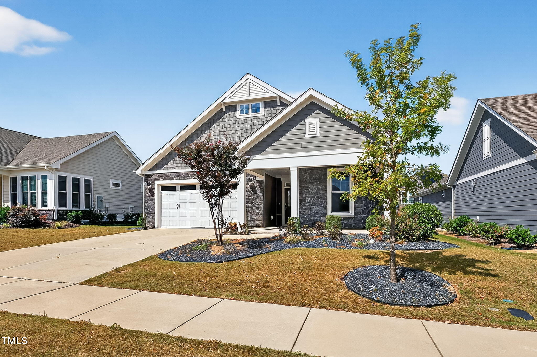 1217 Linkwood Way Fuquay-Varina, NC 27526 - Photo 5 of 44 a front view of a house with entertaining space