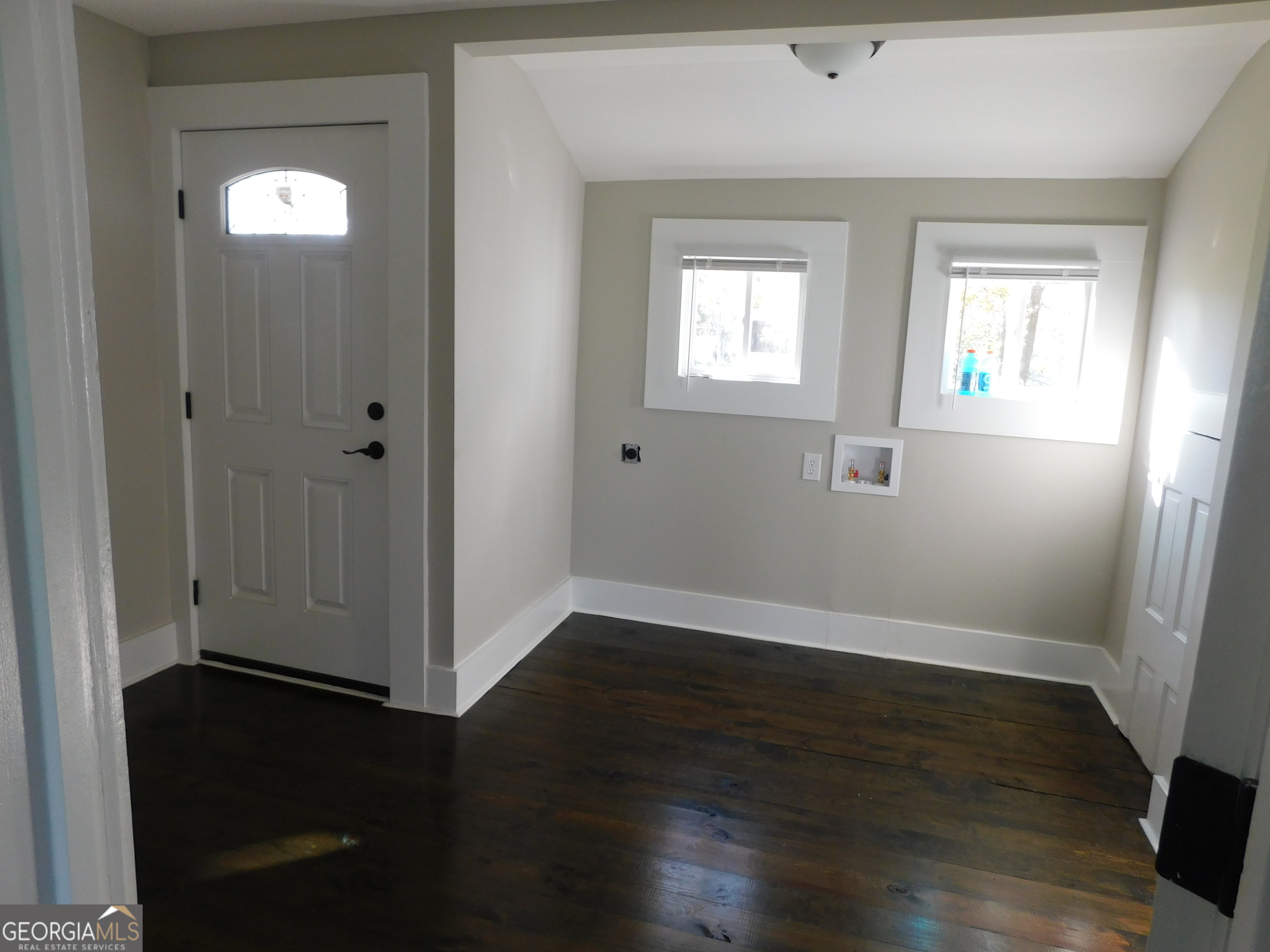 206 East Lane Street Brooklet, GA 30415 - Photo 22 of 33 a view of empty room with wooden floor and fan