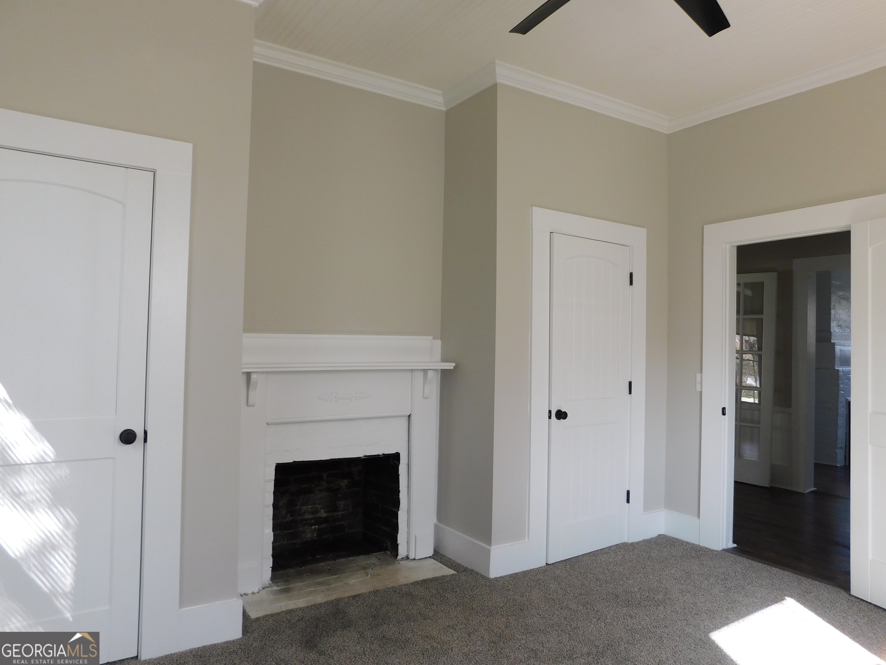 206 East Lane Street Brooklet, GA 30415 - Photo 23 of 33 a view of an empty room with a fireplace
