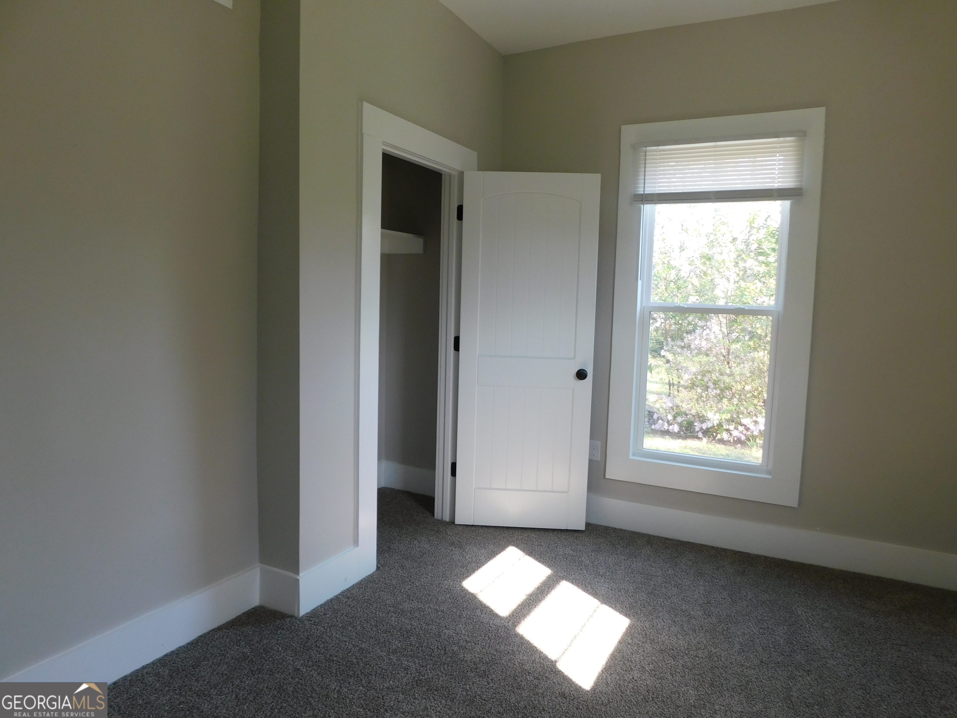 206 East Lane Street Brooklet, GA 30415 - Photo 27 of 33 an empty room with windows