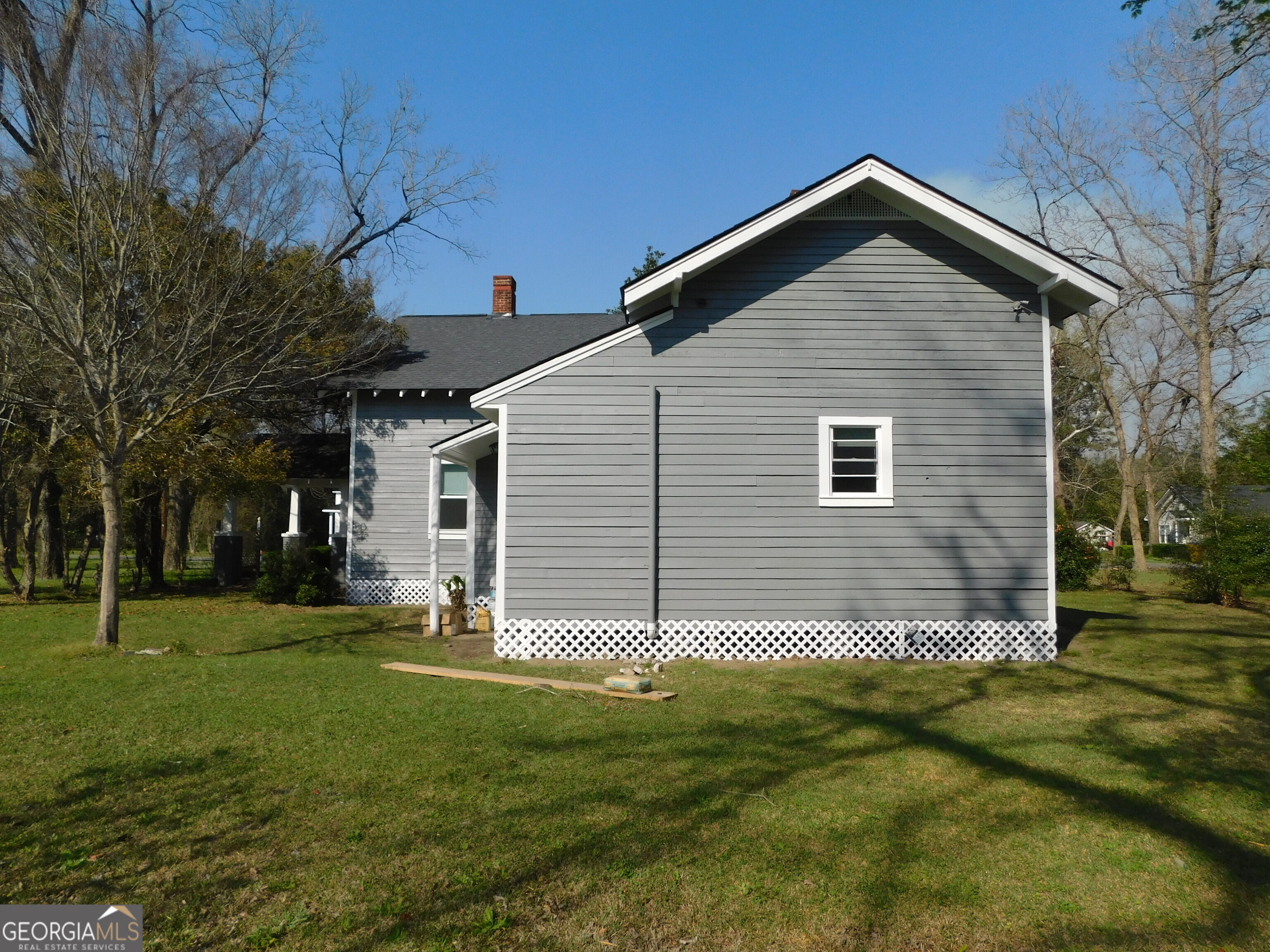 206 East Lane Street Brooklet, GA 30415 - Photo 7 of 33 a front view of a house with a yard