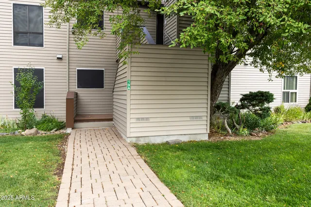a view of a back yard of the house