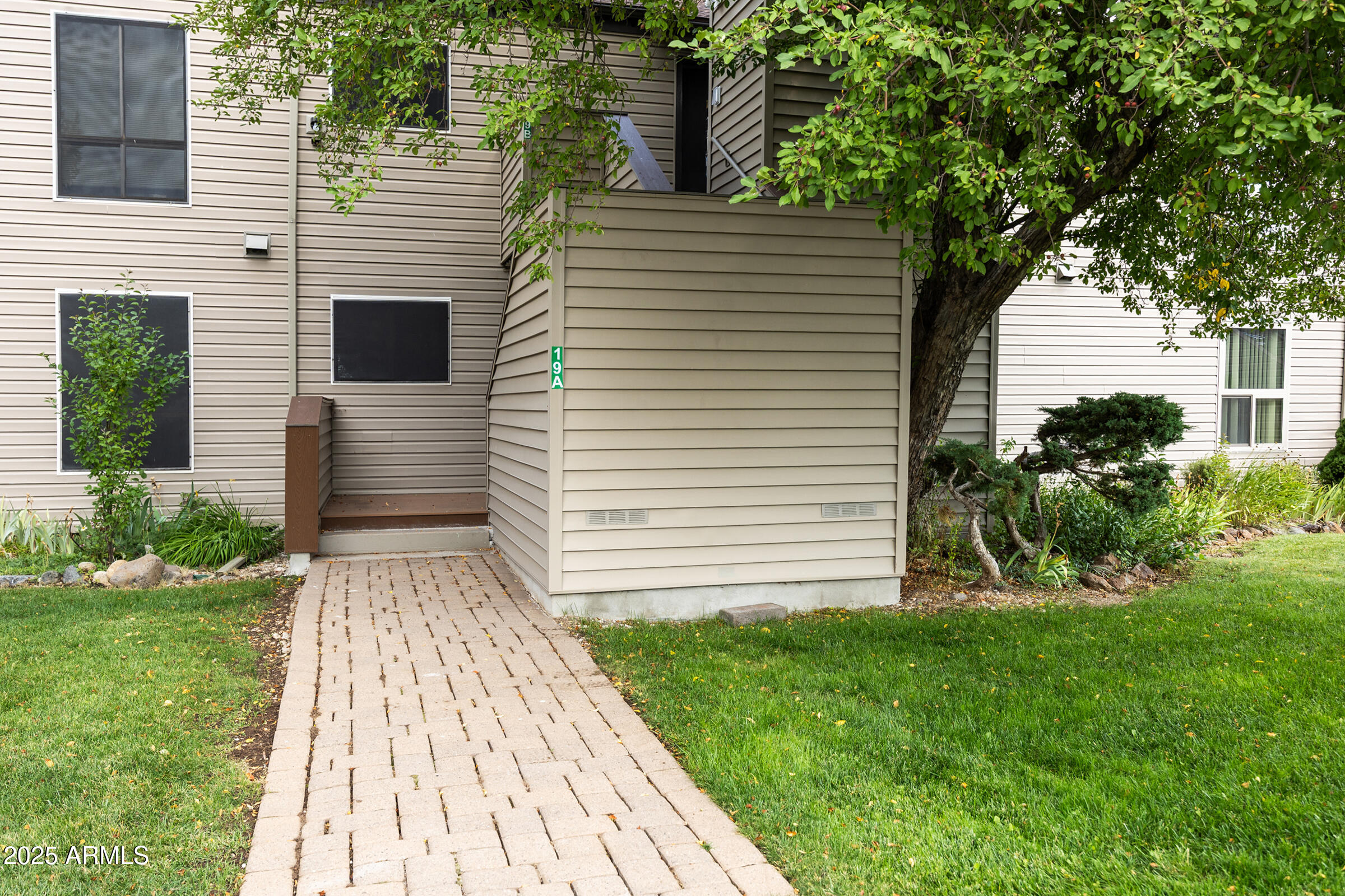 a view of a back yard of the house