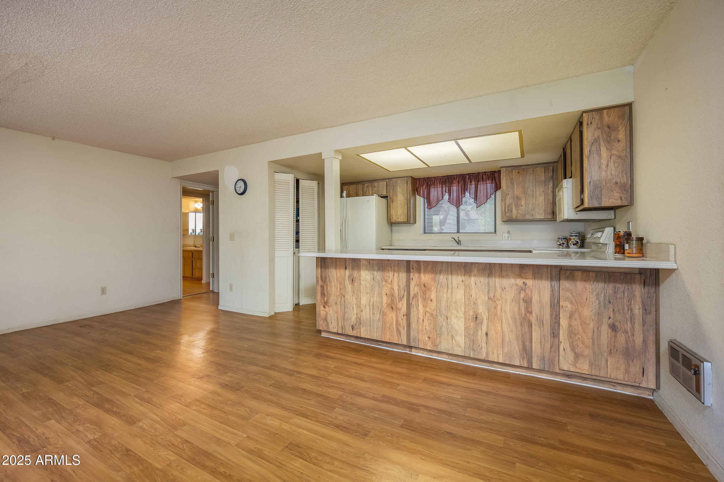 17980 Walapai Road, Unit 19A Munds Park, AZ 86017 - Photo 12 of 32 a view of a kitchen with a sink and a window