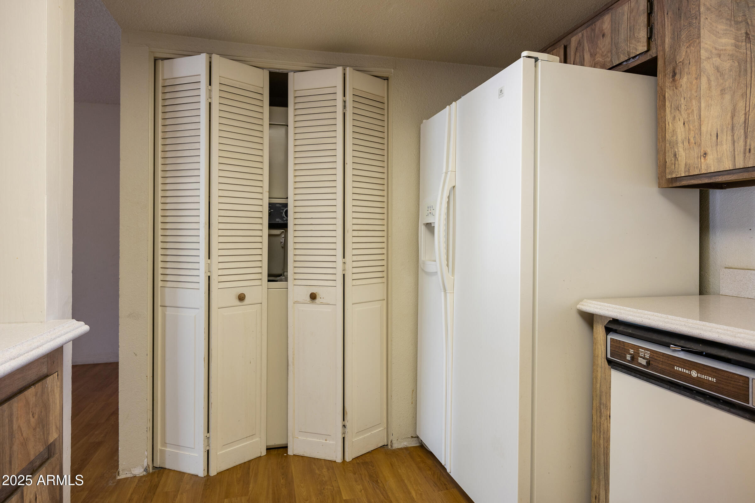 17980 Walapai Road, Unit 19A Munds Park, AZ 86017 - Photo 13 of 32 a view of a kitchen with wooden floor