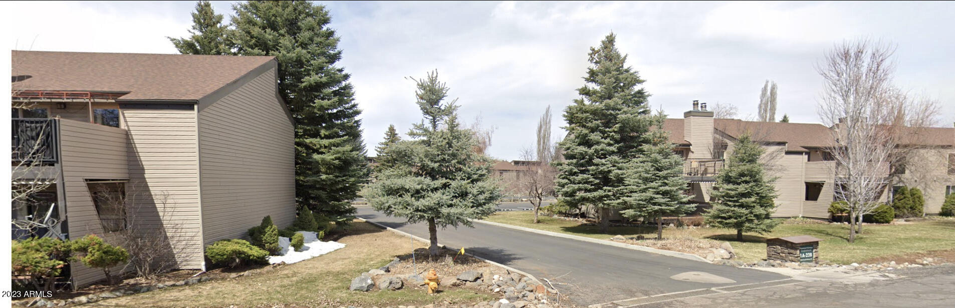 17980 Walapai Road, Unit 19A Munds Park, AZ 86017 - Photo 19 of 32 a view of a house with a yard