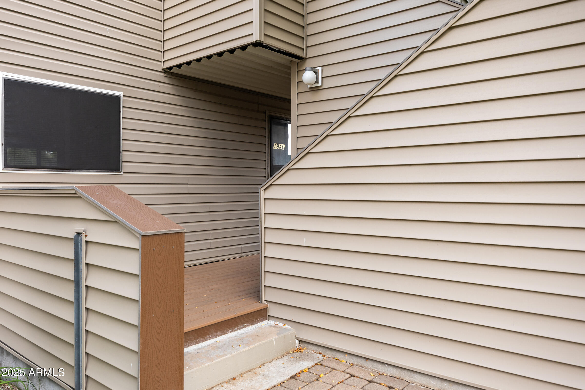17980 Walapai Road, Unit 19A Munds Park, AZ 86017 - Photo 2 of 32 a view of a house with a door