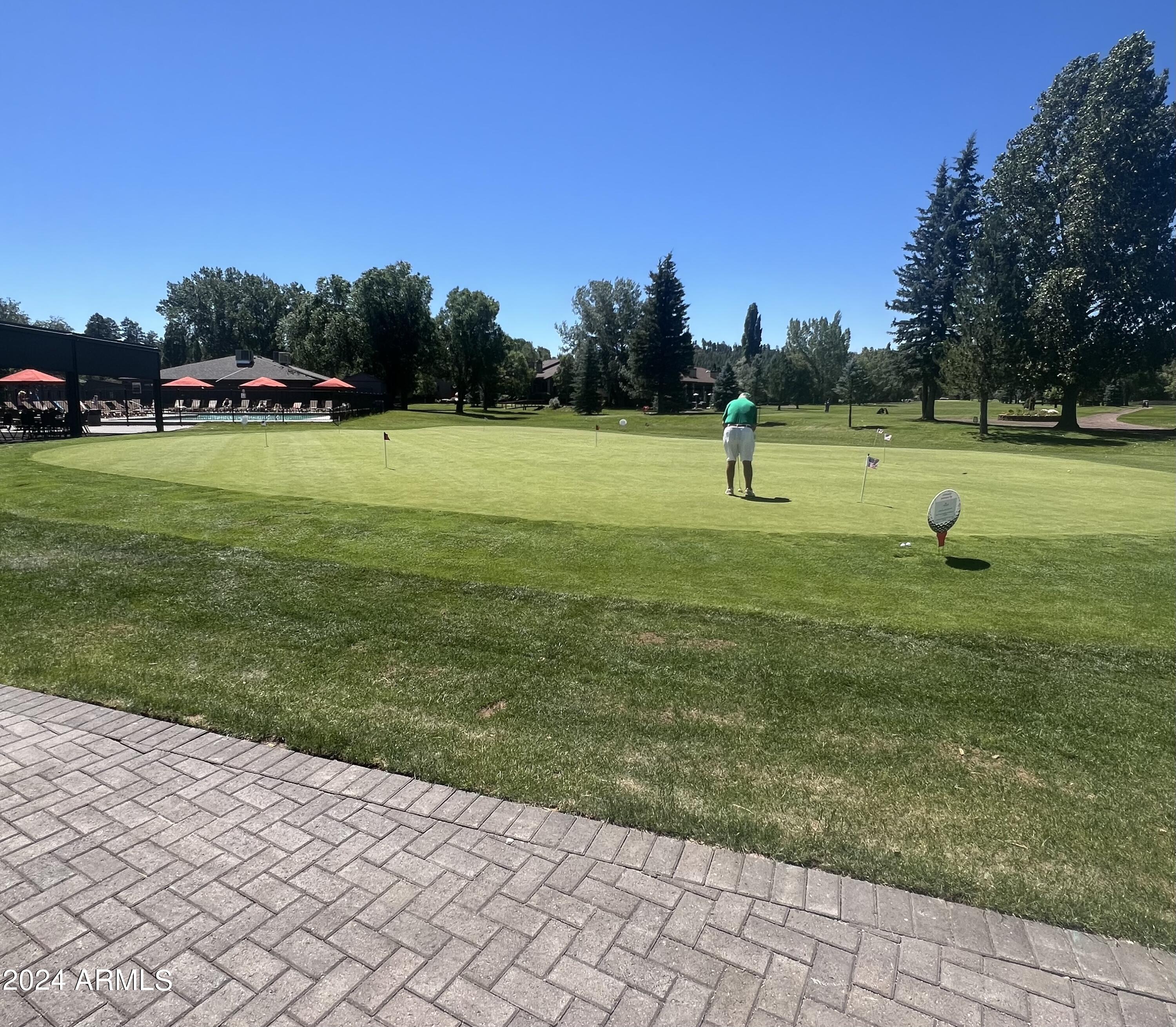 17980 Walapai Road, Unit 19A Munds Park, AZ 86017 - Photo 21 of 32 a view of a park with large trees