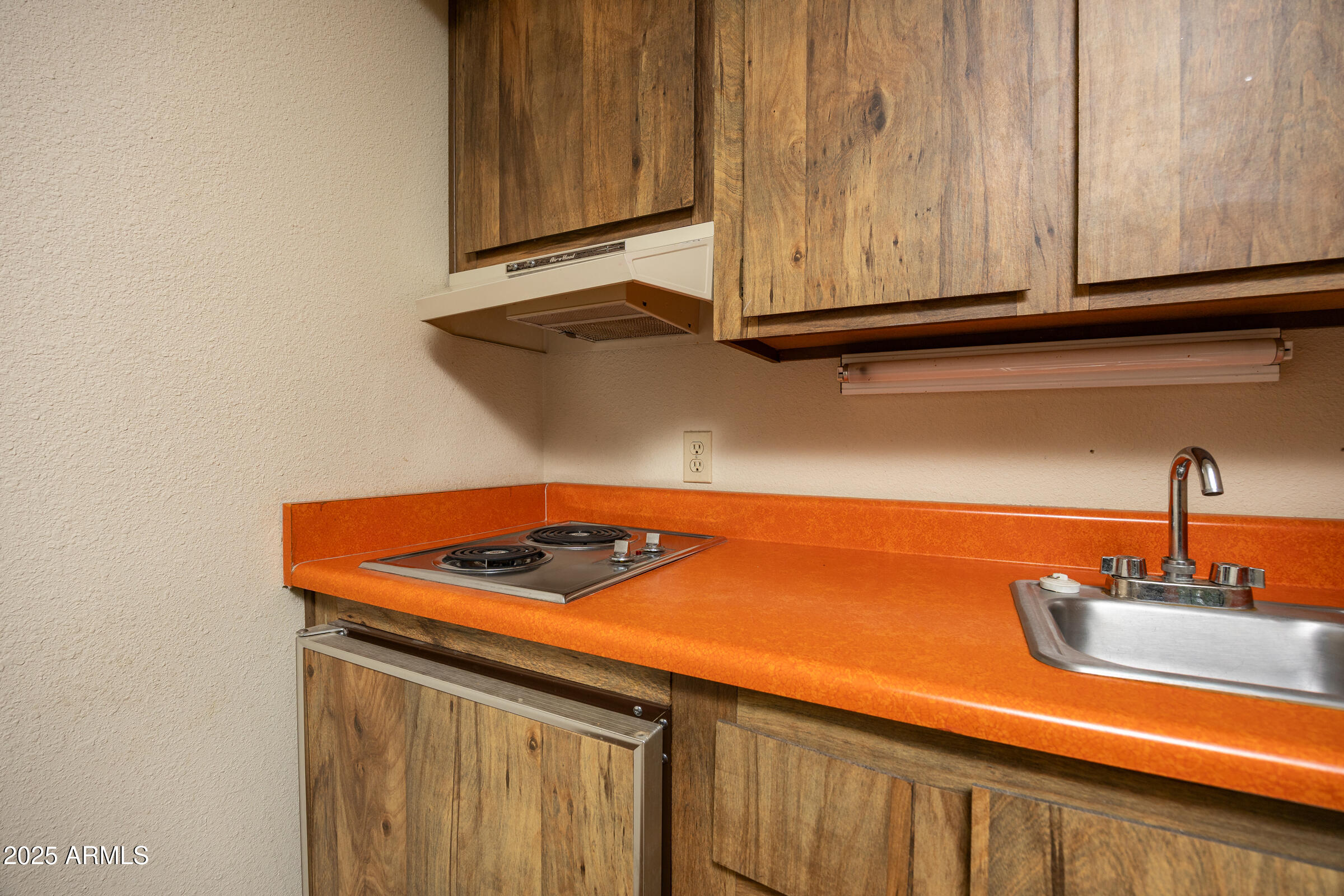 17980 Walapai Road, Unit 19A Munds Park, AZ 86017 - Photo 26 of 32 a close view of sink and cabinets