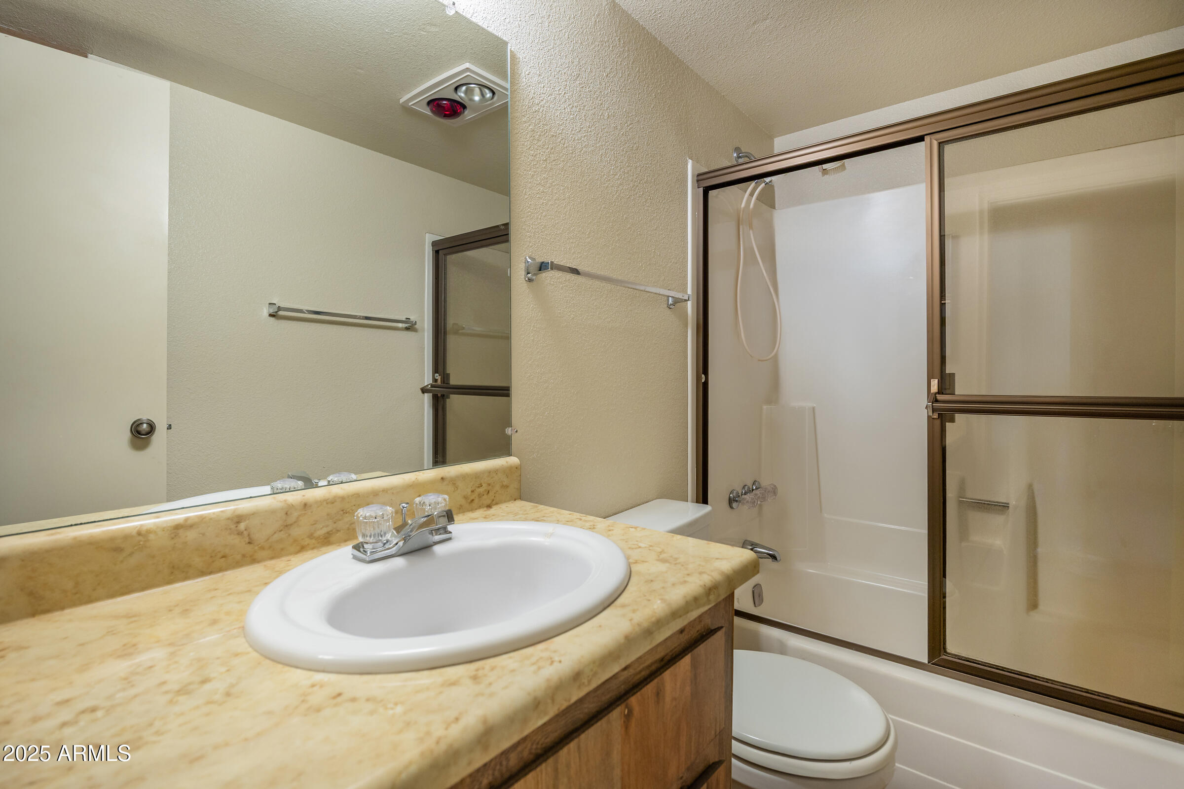 17980 Walapai Road, Unit 19A Munds Park, AZ 86017 - Photo 32 of 32 a bathroom with a sink toilet and shower
