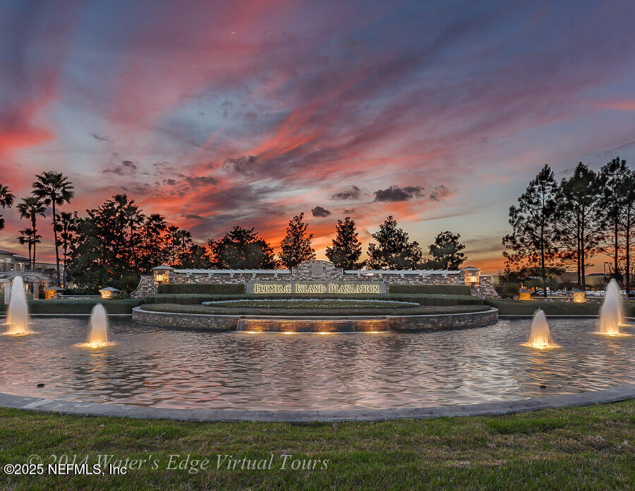2124 Pond Spring Way Fleming Island, FL 32003 - Photo 46 of 56 1 - FIP entrance twilight shot