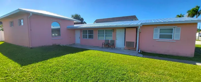 a view of outdoor space yard and front view of a house