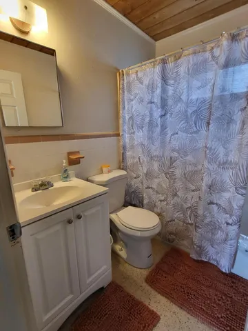 a bathroom with a sink and a toilet