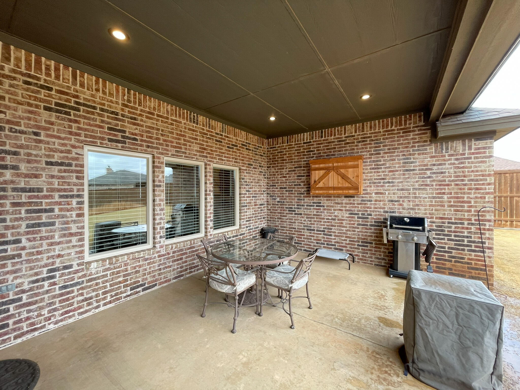 3808 138th Street Lubbock, TX 79423 - Photo 12 of 17 a patio with patio couch and chairs