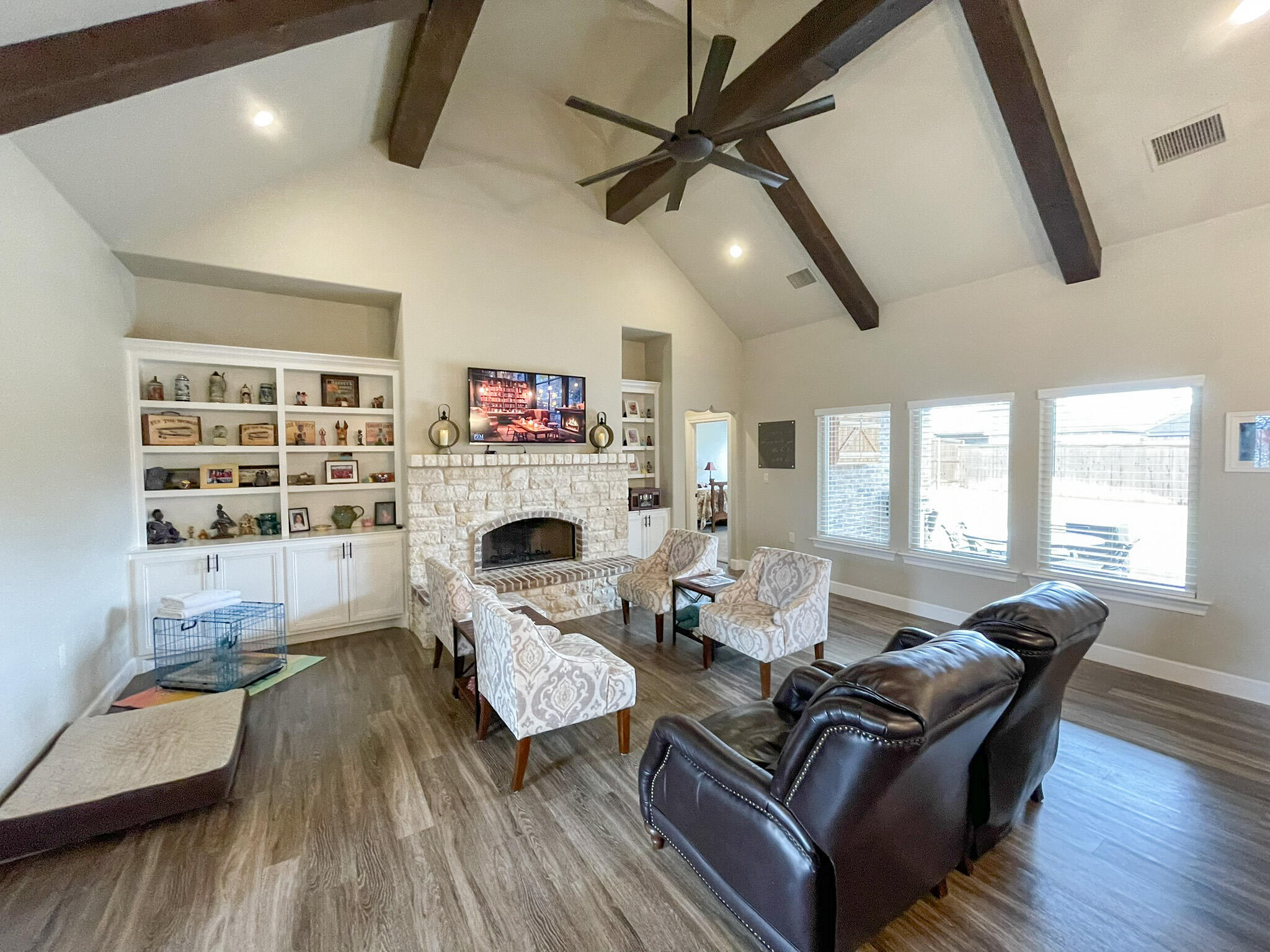 3808 138th Street Lubbock, TX 79423 - Photo 3 of 17 a living room with furniture and a wooden floor