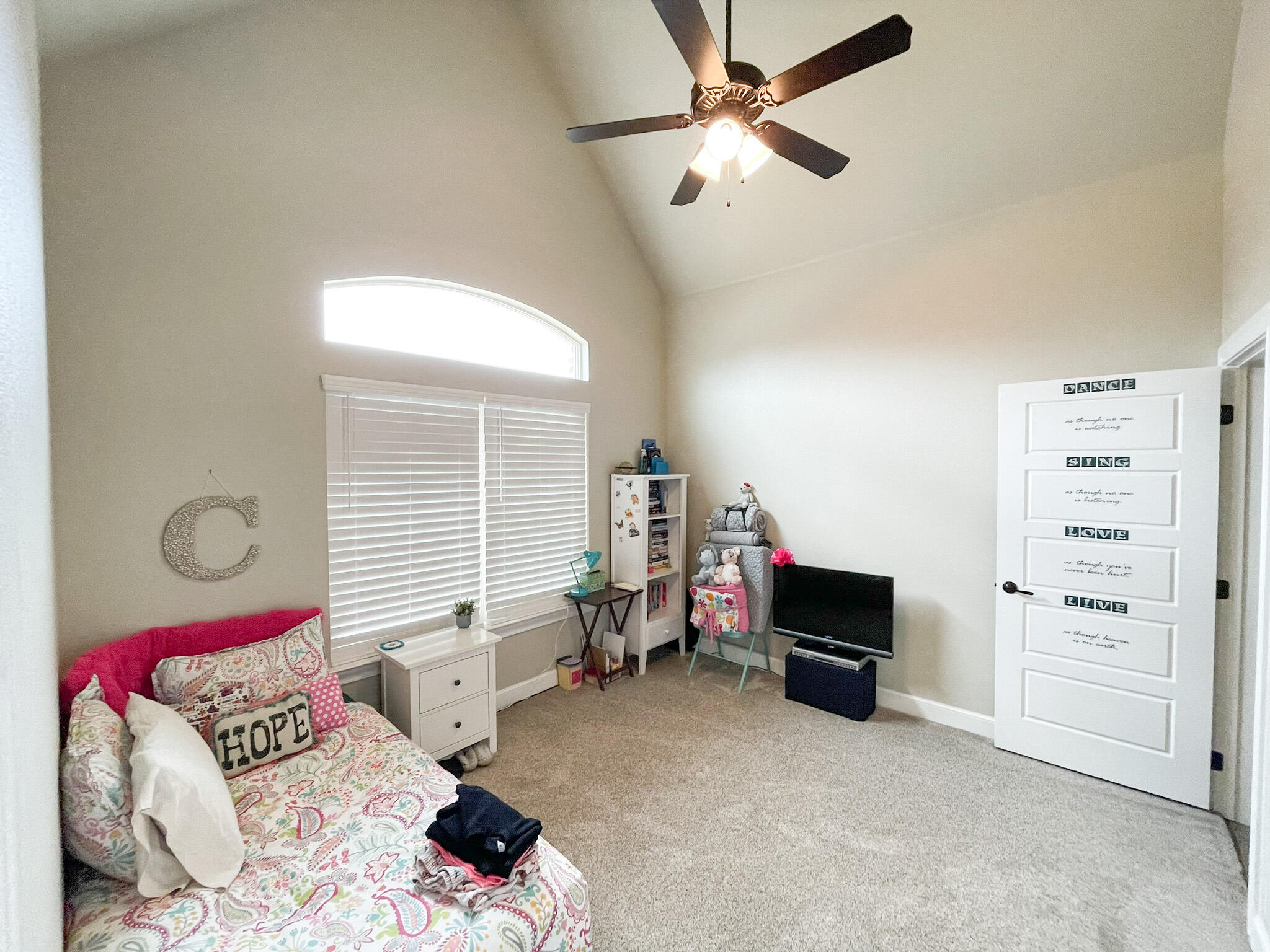3808 138th Street Lubbock, TX 79423 - Photo 9 of 17 a bedroom with furniture and a window